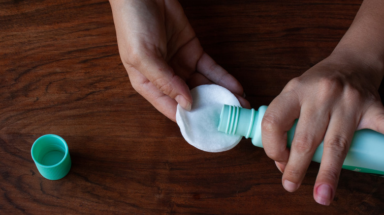 nail polish remover and cotton pad