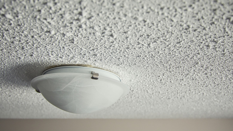 Popcorn ceiling with a light fixture