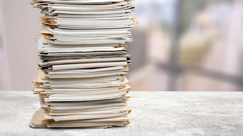 Stack of papers on counter