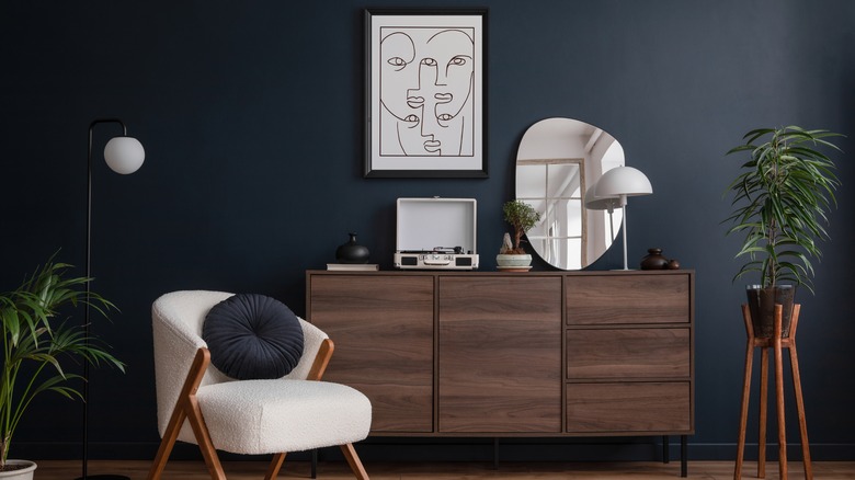 Room with dark blue walls