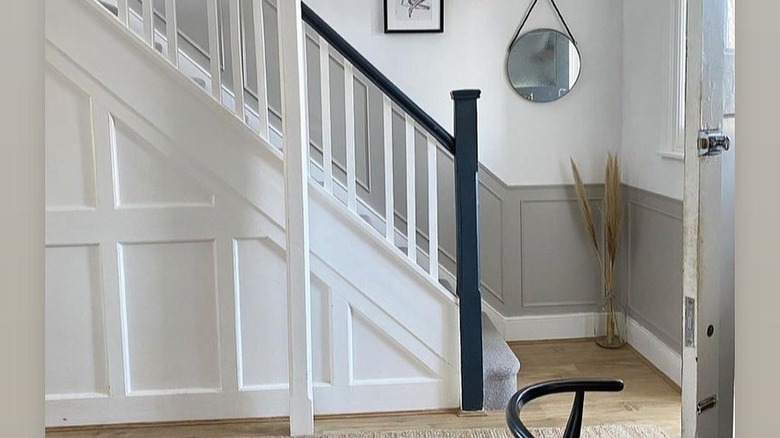 Dark blue handrail and newel