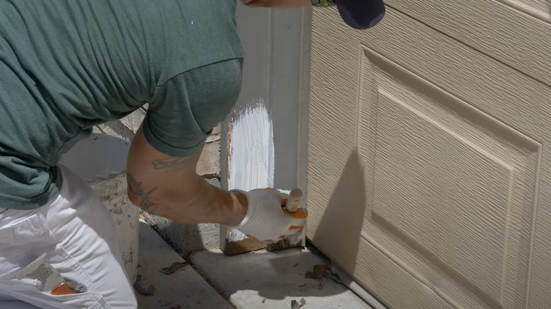 person priming exterior