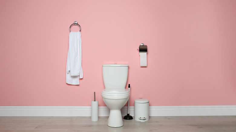 Pink bathroom with toilet