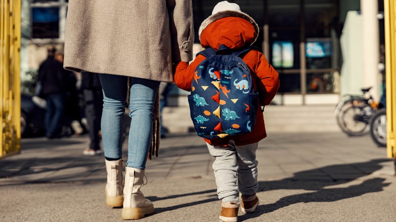 Mom and child walking 