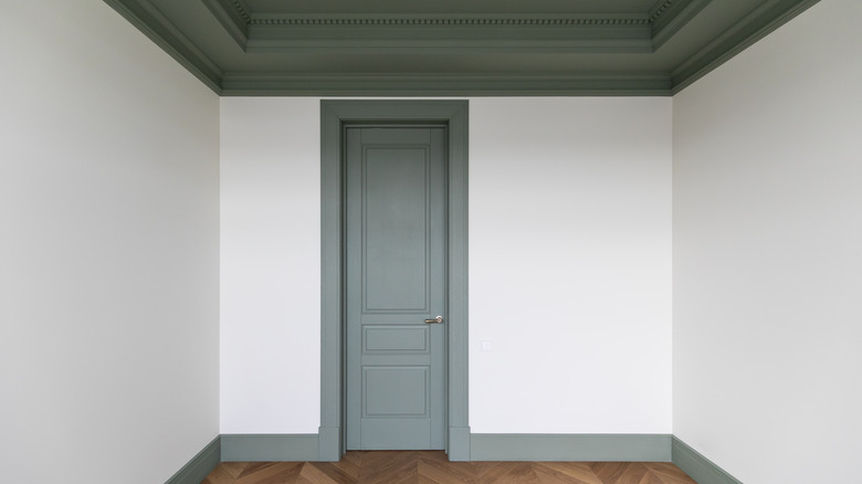 room with sage doors and trim