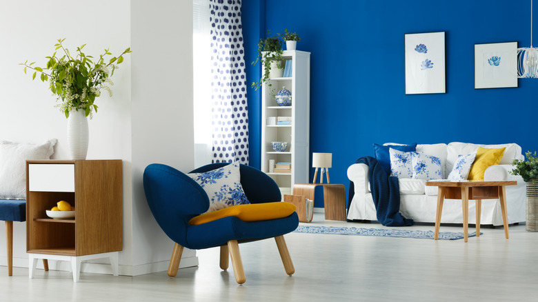 Dark blue and mustard living room