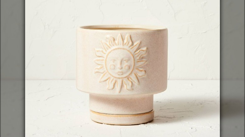 Planter with sun face