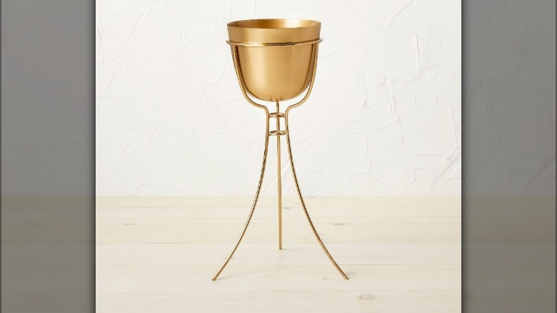 Brass raised planter