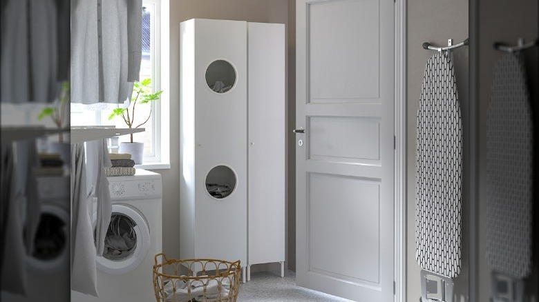 White cabinet in laundry room