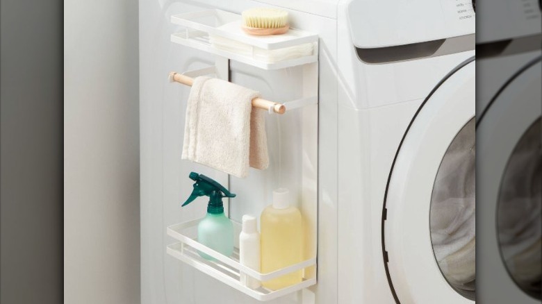 white metal shelf on dryer