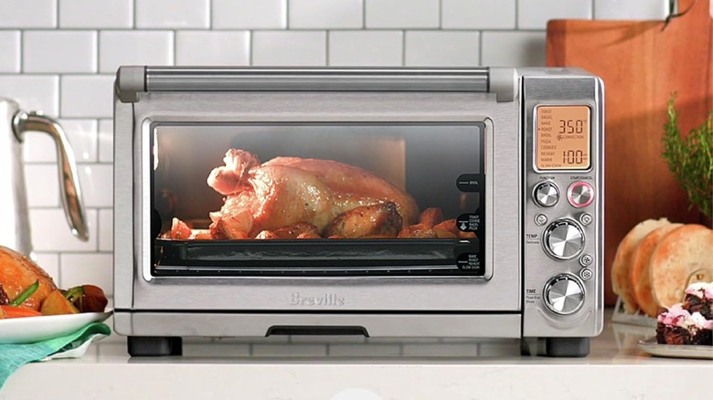 A chicken cooking in a Breville Smart Oven Pro