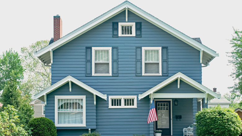 Large house with blue paneling