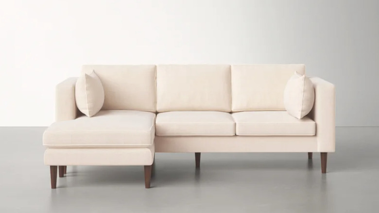 cream colored sectional sofa