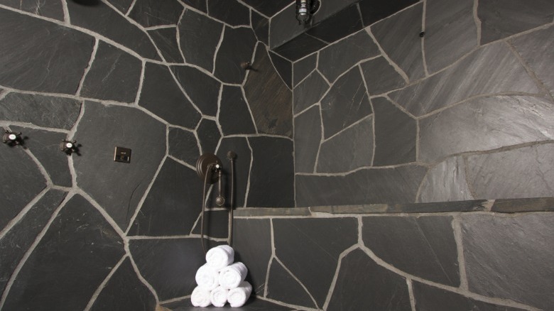 Black slate wall in shower