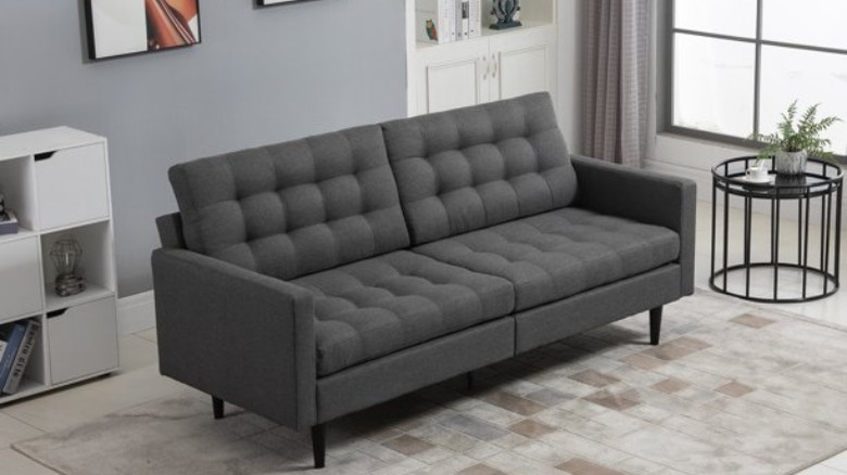 Grey button sofa