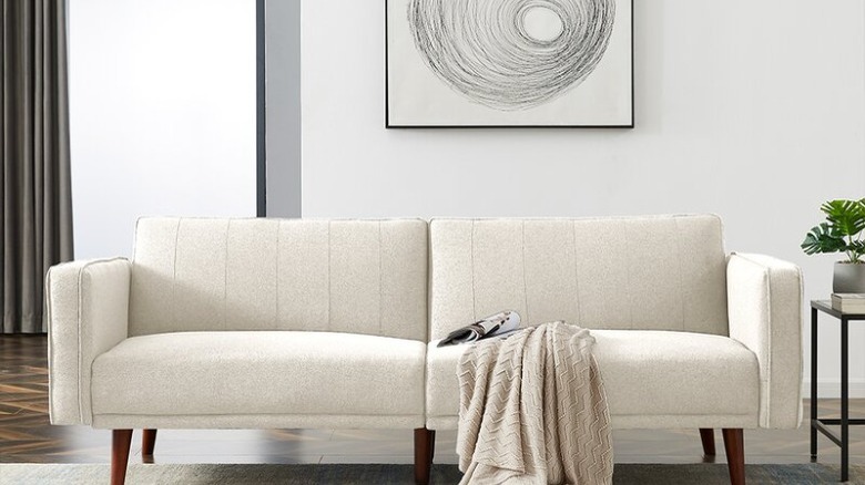 beige white sofa