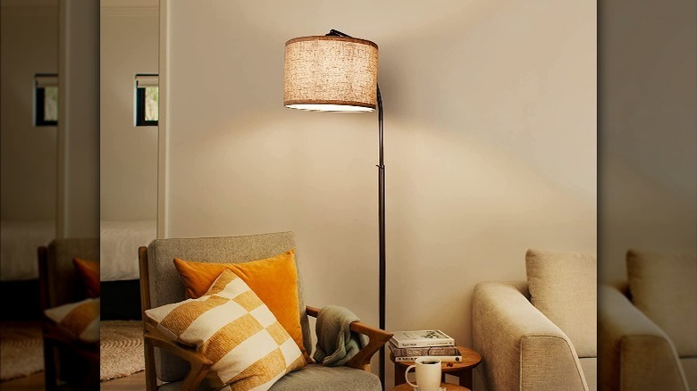 beige lampshade standing lamp