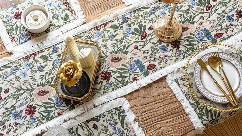 Table set with floral runner