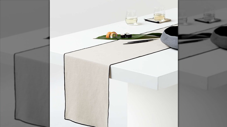 White table runner on white table