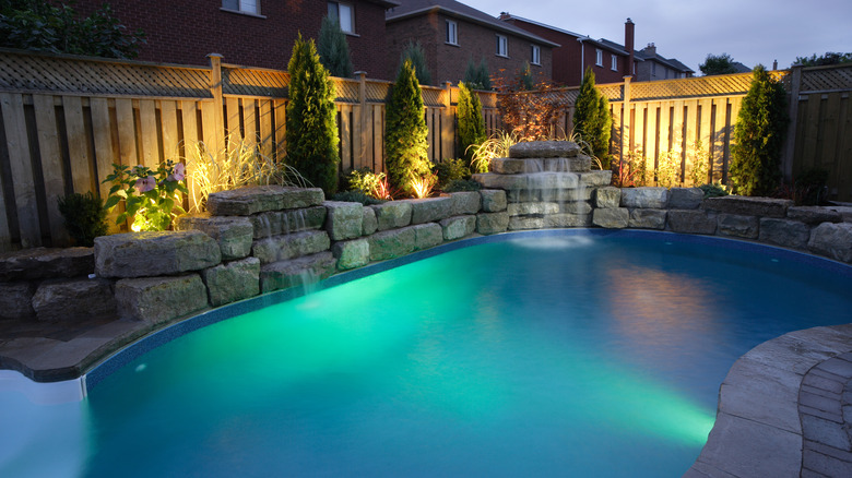 Backyard pool at night