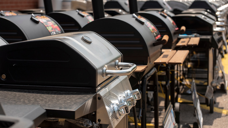 Rows of new barbecues for sale