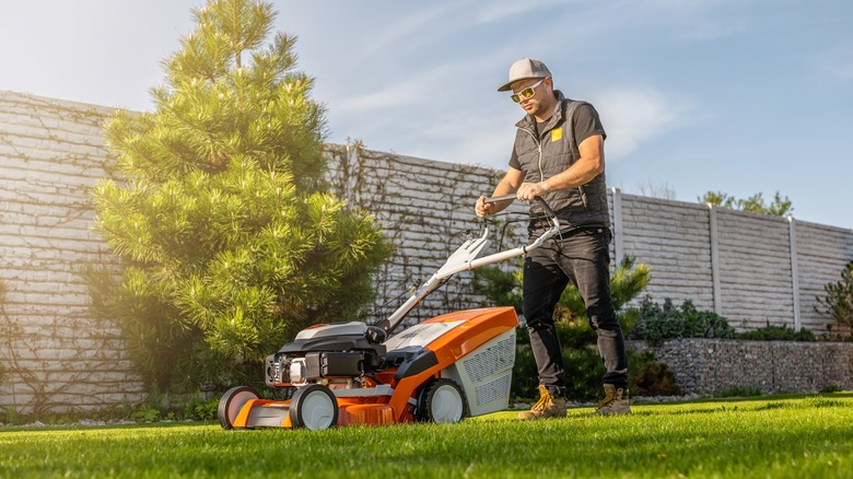 person mowing the lawn