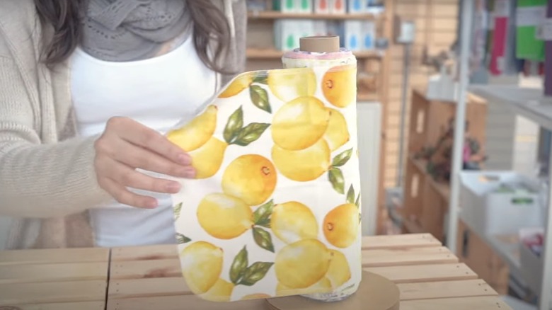 woman pulling unpaper towel