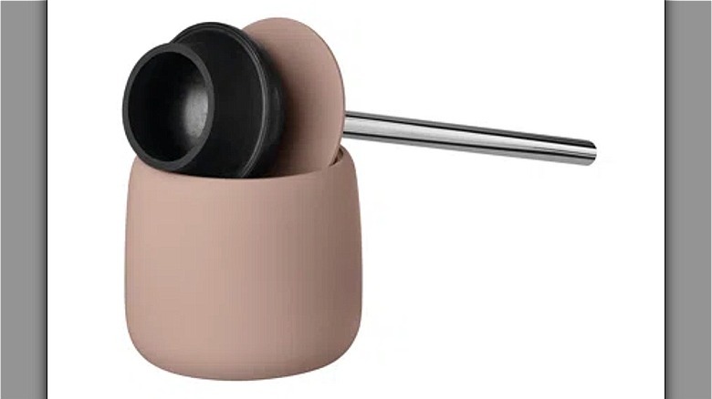 pink and metal toilet plunger