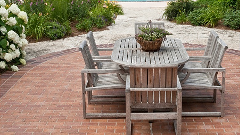 Brick patio with wooden table