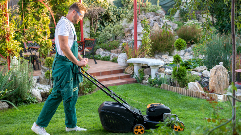 man mowing the lawn