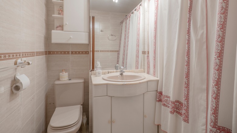 Light colored small bathroom