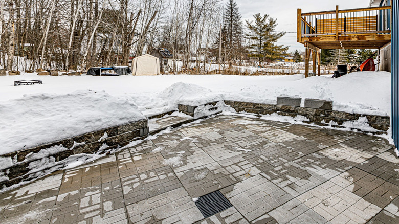 snow covered patio pavers