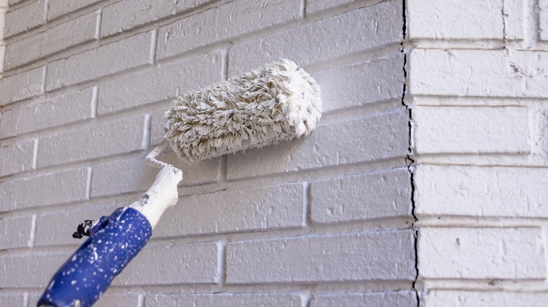 painting wall with a roller