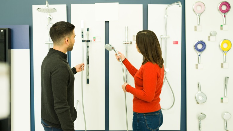 Couple looking at shower heads