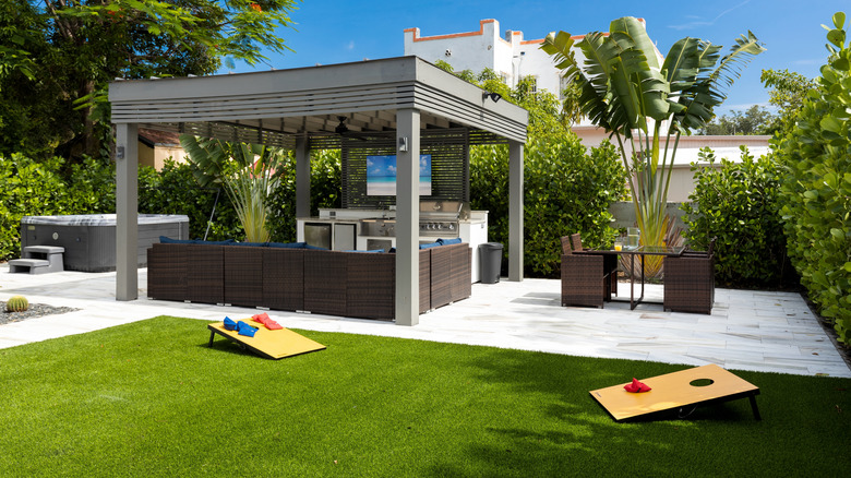 A backyard with artificial gras