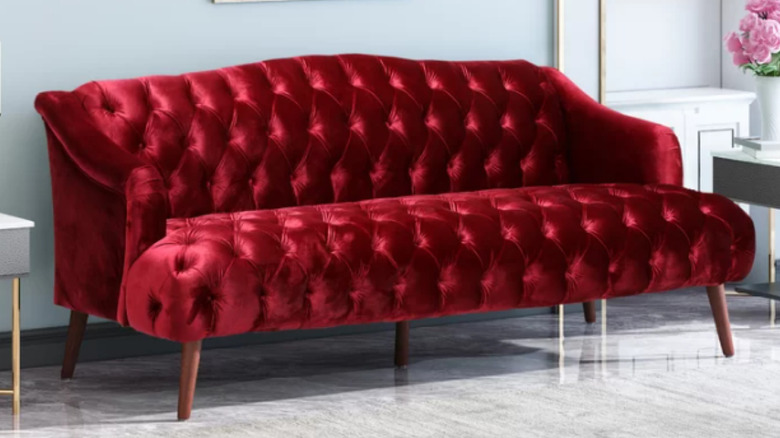 wine colored velvet sofa