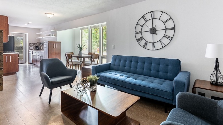 living room with blue couch 