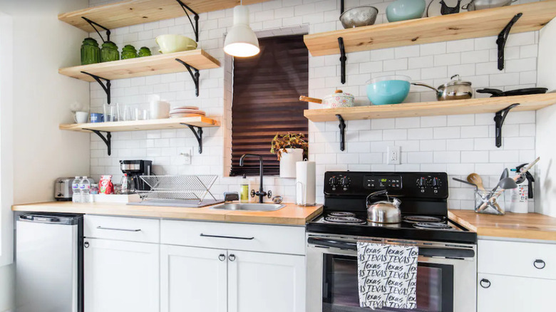 open shelving in white kitchen