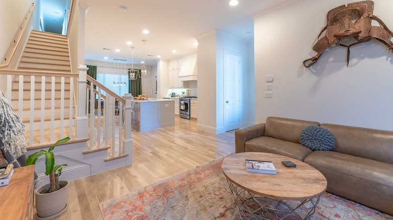 white kitchen and living room