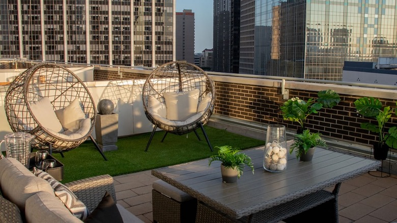 rooftop with circle chairs and table