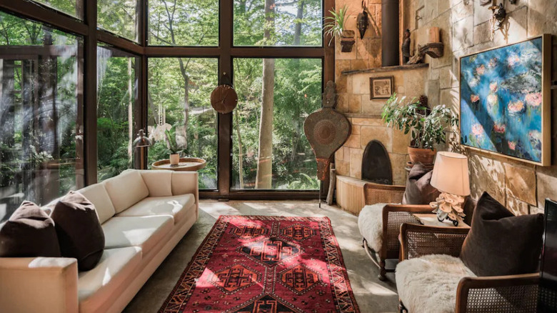 bohemian living room with huge windows 