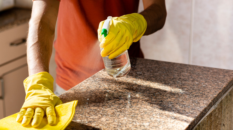 Cleaning granite countertops in the kitchen