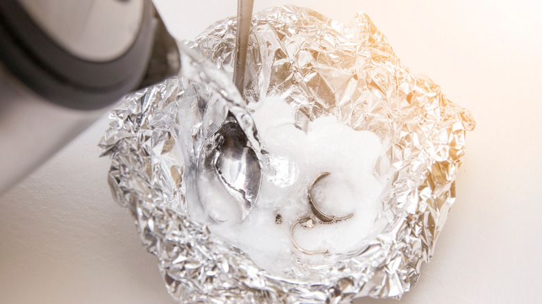 hot water, foil, baking soda