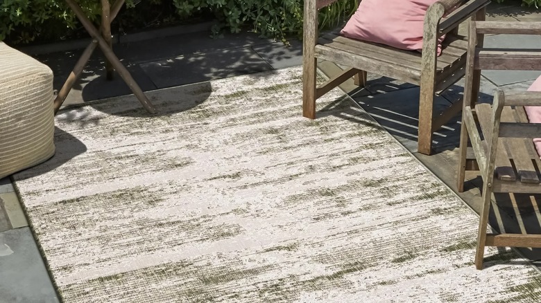 area rug on slate floor