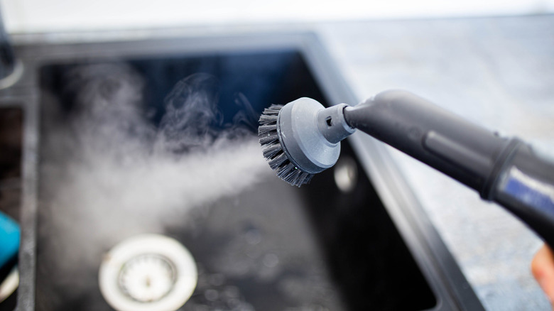 steam cleaner in sink 