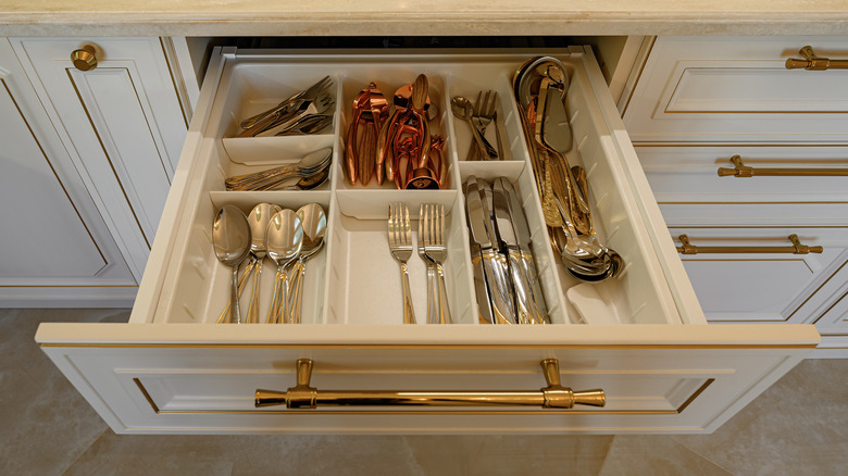 kitchen drawer filled with silverware