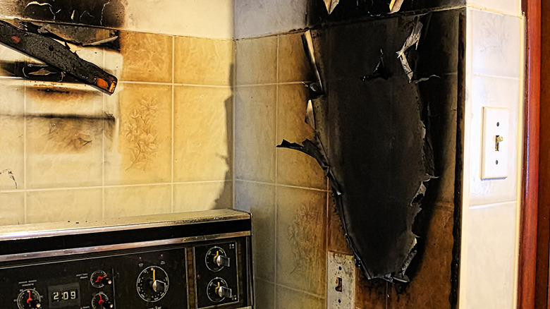 burnt kitchen appliance and wall