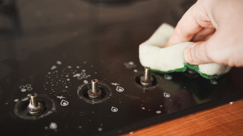 Removed stove knobs during cleaning