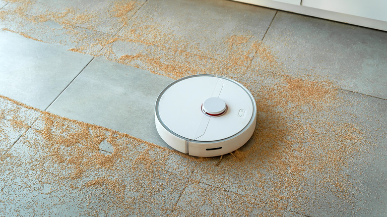 Vacuum cleaner on tiled floor