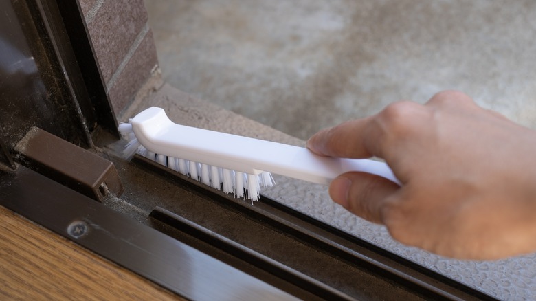 Cleaning sliding door tracks